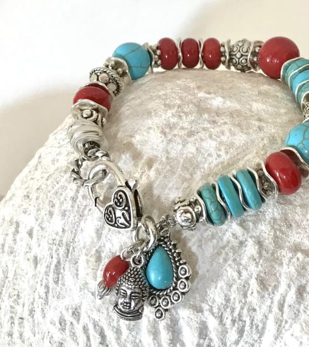 Rood met turquoise boeddha armband in zilver 1